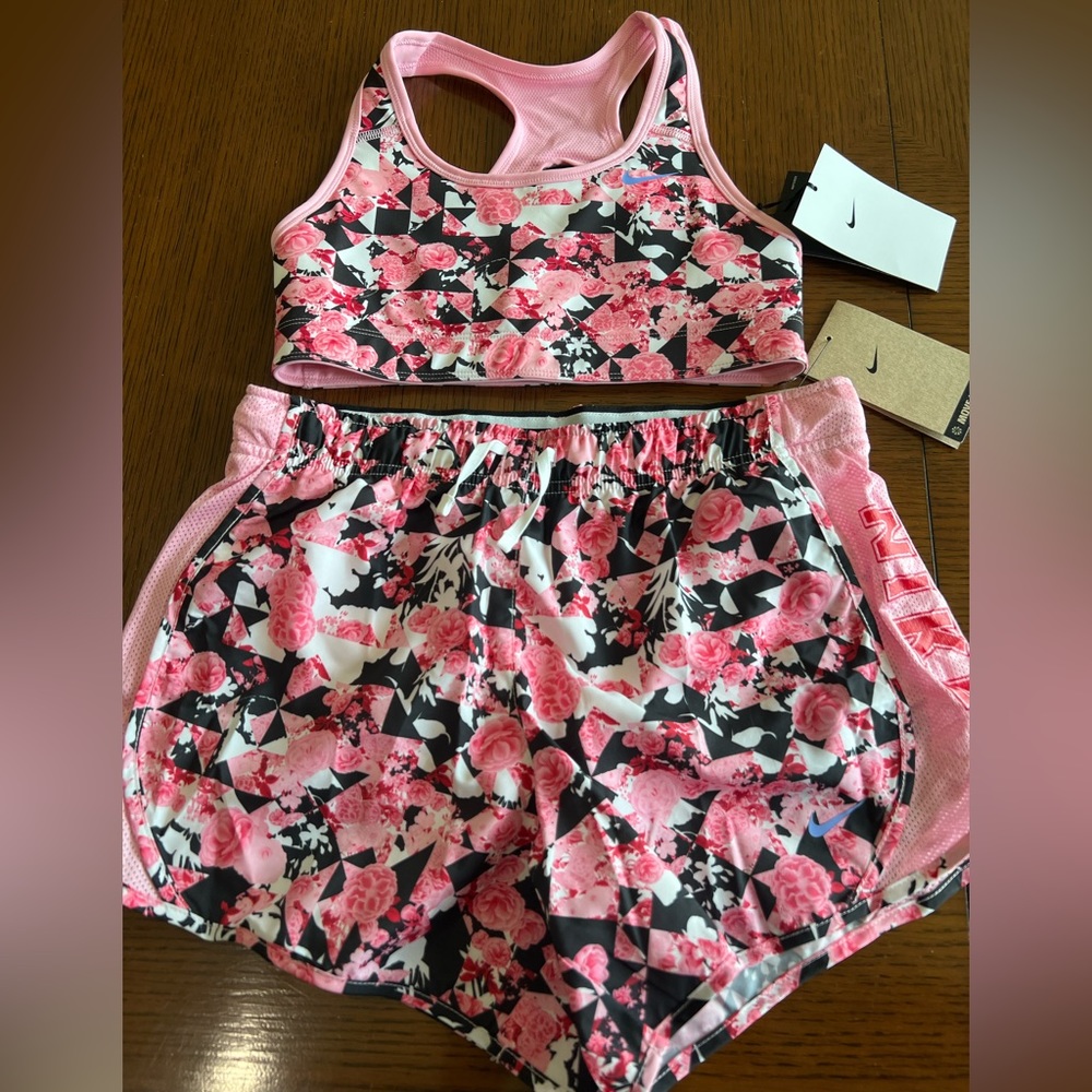 Nike set for girls. Sports bra size M and short size L. New with tags.